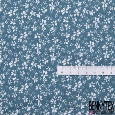 Coton imprimé pensée sauvage coloris blanc sucre brun bleu argent fond sable mouvant