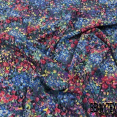 Coupon 3m crêpe polyester satiné petit motif floral stylisé ton jade bleu charron fushia mandarin fond noir