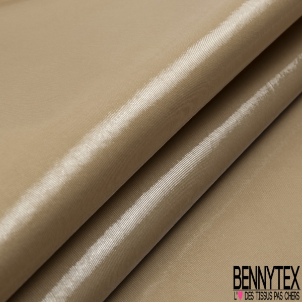 Gabardine de coton sergé plastifiée nude beige rosé