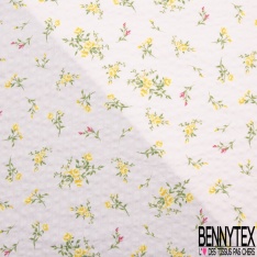 Polycoton sursucker gaufré mini rose sur tige fond rose layette