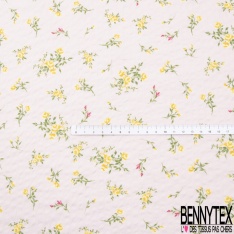 Polycoton sursucker gaufré mini rose sur tige fond rose layette